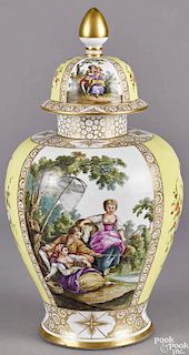 Dresden porcelain urn and cover, early 20th c., with hand-painted scenes of figures fishing