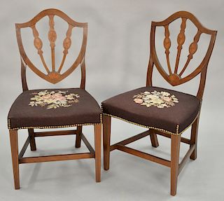 Pair of Federal style side chairs with needlepoint seats.