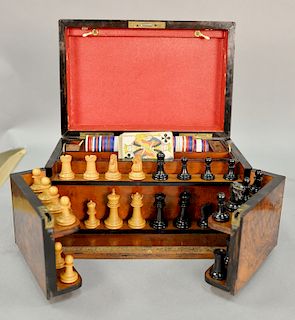 Burlwood game box including chess men and board, cards, and chips. ht. 7 in., lg. 12 1/2 in.