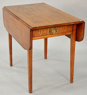 Federal tiger maple drop leaf table on square tapered legs, circa 1800. ht. 28 in., dia. 33 1/2" x 52"