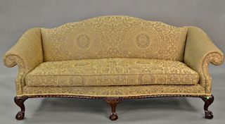 Chippendale style sofa with rolled arms and claw and ball feet, having custom upholstery, length 93 inches.