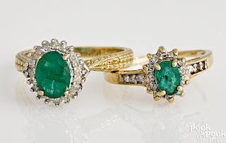 Two 10K yellow gold emerald and diamond rings