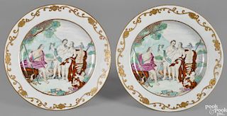 Pair of Chinese export porcelain Judgment of Paris plates, ca. 1750, with European scroll borders