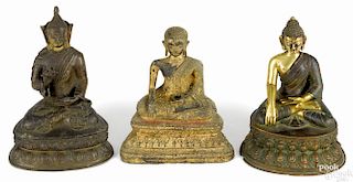 Three Tibetan gilt bronze figures of Buddha, tallest - 6''.