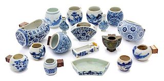 * Eighteen Chinese Blue and White Porcelain and Cloisonne Enamel Bird Feeders Length of largest 3 3/8 inches.