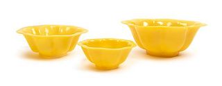 * Three Chinese Yellow Peking Glass Bowls Diameter of largest 9 inches.