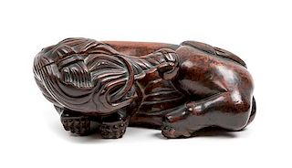 * A Chinese Hardwood Figure of an Elephant Length 11 1/2 inches.