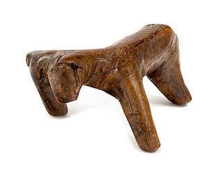 * A Chinese Wood Figure of an Ox Length 9 1/2 inches.