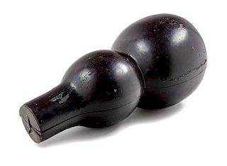 * A Chinese Black Lacquered Wood Gourd-Form Box Length 19 inches.