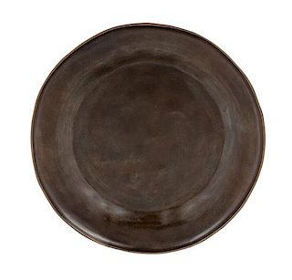 * A Japanese Black Lacquer Plate Diameter 10 1/4 inches.