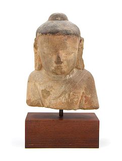 * A Southeast Asian Sandstone Head of Buddha Approximate height 9 inches.