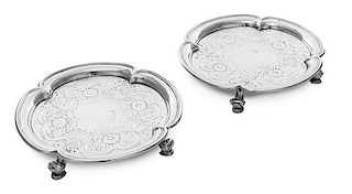 * A Pair of Irish George II Silver Waiters, Erasmus Cope, Dublin, 1736, of quatrefoil form chased with scrolls and flowers, rais