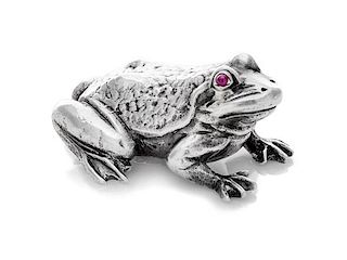 * An Edwardian Silver Zoomorphic Figure, Harold Child, London, 1908, of a frog with hardstone cabochon inset eyes.