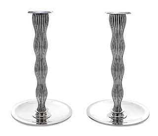 * A Pair of Danish Silver Candlesticks, Designed by Svend Weihrauch for Frantz Hingelberg, Aarhus, Mid-20th Century, of tapered