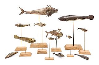 * A Group of Twelve Articulated Models of Fish, Various Makers, 19th/20th Century, each with a stand, comprising an English silv