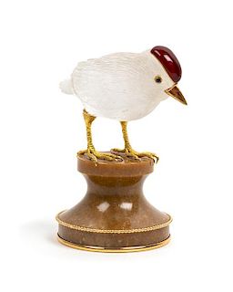 * A French 18 Karat Gold Mounted, Enamel and Carved Quartz Zoomorphic Figure, Boucheron, Paris, 20th Century, of a bird on a car