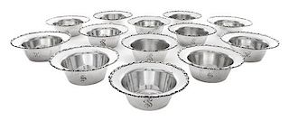 * A Set of Twenty-Two American Silver Nut Dishes, Shreve & Co., San Francisco, CA, 20th Century, the rim worked with C-scroll an