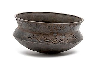 * A Middle Eastern Bronze Bowl Height 3 1/2 x diameter 8 inches.