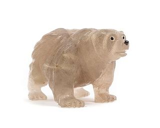 * A Carved Quartz Figure of a Polar Bear Height 3 1/2 x length 6 1/2 inches.