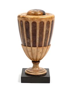 * An English Inlaid Alabaster Urn and Cover Height 9 inches.