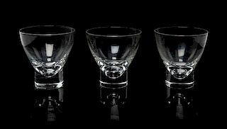 * A Set of Twelve Steuben Footed Glass Tumblers Height 3 3/4 inches.