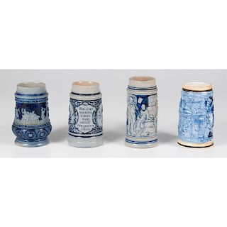 Four Cobalt Decorated Beer Steins