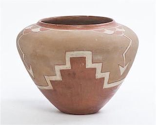 * A Pueblo Pottery Redware Jar, Height 7 inches.