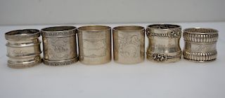 6 ANTIQUE STERLING & COIN NAPKIN RINGS