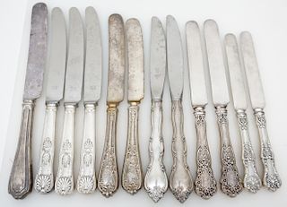12 VARIOUS STERLING HANDLE DINNER KNIVES