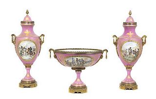 A Sevres Style Gilt Metal Mounted Porcelain Garniture, Height of urns 25 inches.