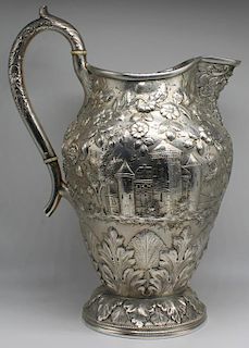 SILVER. S.Kirk & Son Coin Silver Repousse Pitcher.
