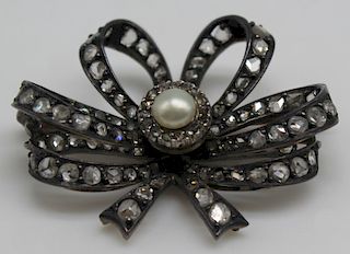 JEWELRY. Antique Diamond and Pearl Bow Form Brooch