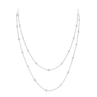A Platinum Diamond Opera Length Necklace