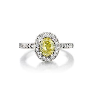A 1.02-Carat Fancy Intense Yellow Oval-Shaped Diamond Ring