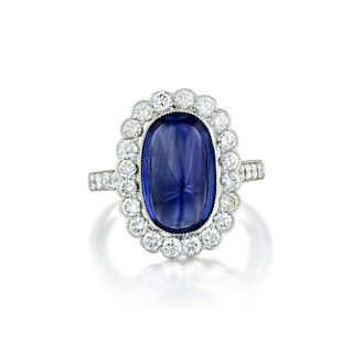 A Platinum Unheated Ceylon Sapphire and Diamond Ring