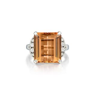 A Platinum Imperial Topaz and Diamond Ring