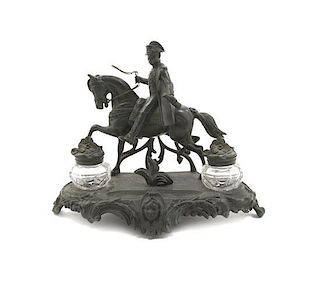 A Continental Cast Metal Figural Encrier, Width 13 inches.