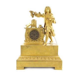 A French Empire Gilt Bronze Figural Mantel Clock, Height 22 1/2 inches.