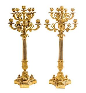 A Pair of Empire Style Gilt Bronze Nine-Light Candelabra, Height 29 inches.