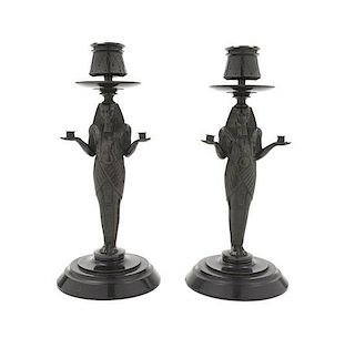 A Pair of Egyptian Revival Bronze Figural Candlesticks, Height 8 1/2 inches.