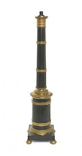 An Empire Style Gilt and Patinated Bronze Columnar Lamp, Height overall 36 1/4 inches.