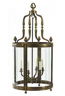 A Neoclassical Style Six-Light Gilt Bronze and Brass Lantern, Height 45 1/2 x diameter 21 3/4 inches.