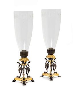 A Pair of Louis Philippe Gilt and Patinated Bronze Candlesticks, Height overall 16 5/8 inches.