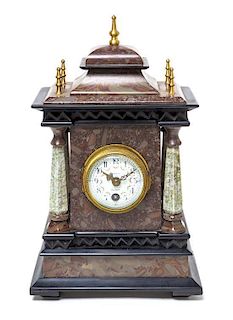A French Various Stones Table Clock, retailed by Tatman, Height 9 3/8 inches.