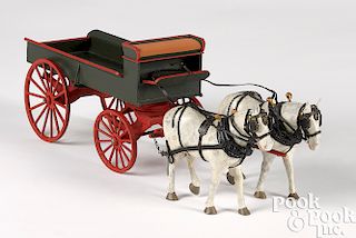 Carved and painted wood horse drawn farm wagon
