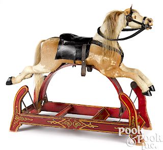 Hide covered wooden rocking horse