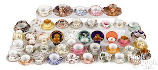 Miniature china tea cups and saucers