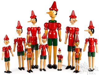 Ten Italian painted wood Pinocchio dolls