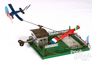 German painted tin Aeroport Paris clockwork toy