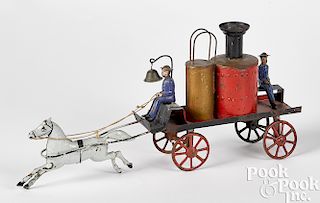 Early painted tin horse drawn fire pumper